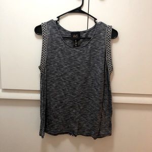 Blue tank. Details on sleeves